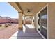 Covered patio with ceiling fan, providing shade and comfort at 4435 Lavender Ln, Pahrump, NV 89061