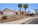 Single-story home with desert landscaping and RV parking at 4527 Buddy Holly Ct, North Las Vegas, NV 89031