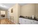 White kitchenette with granite countertops and a small sink at 4527 Buddy Holly Ct, North Las Vegas, NV 89031