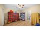 Room with shelving, a toilet and a large plaid blanket at 4527 Buddy Holly Ct, North Las Vegas, NV 89031