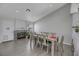 Dining area with hardwood floors, a large table, and fireplace at 4722 Casa Bonita Dr, North Las Vegas, NV 89032