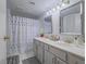 Clean bathroom with double vanity, shower, and updated fixtures at 4750 Obannon Dr # D, Las Vegas, NV 89102