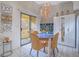 Dining area with round table, wicker chairs, and fish tank at 4750 Obannon Dr # D, Las Vegas, NV 89102