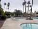 Community pool and spa with lounge chairs at 4750 Obannon Dr # D, Las Vegas, NV 89102