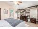 Main bedroom with ceiling fan and ensuite bathroom at 4826 Polar Lights Ct, Las Vegas, NV 89130