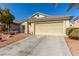 One-story house with attached garage and nicely landscaped yard at 4826 Polar Lights Ct, Las Vegas, NV 89130