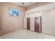 Home office with wall-mounted cabinets and a Murphy bed at 4826 Polar Lights Ct, Las Vegas, NV 89130