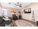 Cozy living room with wood floors and a wood-burning stove at 4826 Polar Lights Ct, Las Vegas, NV 89130