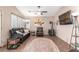 Cozy living room with wood floors and a wood-burning stove at 4826 Polar Lights Ct, Las Vegas, NV 89130