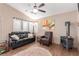 Cozy living room with wood floors and a wood-burning stove at 4826 Polar Lights Ct, Las Vegas, NV 89130