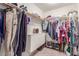 Large walk-in closet with double hanging rods and shelving at 4826 Polar Lights Ct, Las Vegas, NV 89130