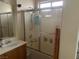 Bathroom with shower/tub combo and single vanity at 5005 Prairie Springs Ct, Las Vegas, NV 89130