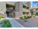 Two-story building with stairs and landscaping at 5006 S Rainbow Blvd # 103, Las Vegas, NV 89118