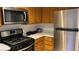 Modern kitchen features stainless steel appliances and ample cabinetry at 5006 S Rainbow Blvd # 103, Las Vegas, NV 89118