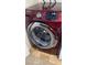 Red Samsung Washer in the laundry room at 5006 S Rainbow Blvd # 103, Las Vegas, NV 89118