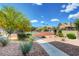 Well-maintained tennis courts surrounded by desert landscaping at 5006 S Rainbow Blvd # 103, Las Vegas, NV 89118