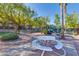 Relaxing courtyard with tables, landscaping, and a shaded area at 5080 Indian River Dr # 403, Las Vegas, NV 89103