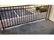 Small patio with metal railing overlooking parking lot at 5080 Indian River Dr # 403, Las Vegas, NV 89103