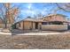 Cute stucco home with a landscaped yard and walkway at 5101 Village Dr, Las Vegas, NV 89142