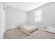 Bright bedroom with neutral walls and carpet flooring at 524 Celebratory Pl, Henderson, NV 89011