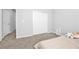 Spacious bedroom with plush carpet and ample closet space at 524 Celebratory Pl, Henderson, NV 89011