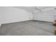 Spacious garage with white walls and open garage door at 524 Celebratory Pl, Henderson, NV 89011