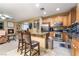 Kitchen with island seating and stainless steel appliances at 5916 Magic Oak St, North Las Vegas, NV 89031