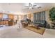 Bright and airy living room with an open floor plan, seamlessly connecting to the kitchen at 5916 Magic Oak St, North Las Vegas, NV 89031