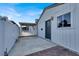 Side view of house, showing a covered carport and gated entrance at 649 Federal St, Henderson, NV 89015