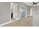 Bright hallway with light gray walls and wood-look flooring at 649 Federal St, Henderson, NV 89015