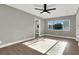 Living room with large window and wood-look flooring at 649 Federal St, Henderson, NV 89015