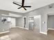 Spacious living room, featuring gray walls and vinyl plank flooring at 649 Federal St, Henderson, NV 89015