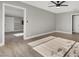 Living room with wood-look flooring and neutral-toned walls at 649 Federal St, Henderson, NV 89015