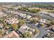 The aerial view showcases an established residential neighborhood with mature landscaping, sidewalks, and community pool at 7288 Olsen Farm St, Las Vegas, NV 89131