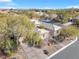 View of a lovely single-story house with a side entry garage and desert landscaping at 7288 Olsen Farm St, Las Vegas, NV 89131