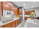 Kitchen featuring granite countertops, stainless steel appliances, and custom cabinetry at 7288 Olsen Farm St, Las Vegas, NV 89131