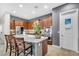 Kitchen island with stainless steel appliances and tile floor at 7288 Olsen Farm St, Las Vegas, NV 89131