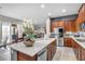 Kitchen island with granite countertop and stainless steel appliances at 7288 Olsen Farm St, Las Vegas, NV 89131