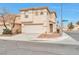 Two-story house with attached garage, landscaping, and a corner lot at 7732 Prosperity River Ave, Las Vegas, NV 89129