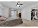 Spacious bedroom with a queen bed and walk-in closet at 7900 Idledale Ct # 102, Las Vegas, NV 89145