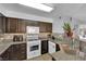 Well-equipped kitchen featuring ample cabinetry and gas range at 7900 Idledale Ct # 102, Las Vegas, NV 89145