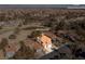 Panoramic aerial view of the property, showcasing its location and proximity to surrounding areas, including the city skyline at 8320 Carmel Ridge Ct, Las Vegas, NV 89113