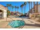 Inviting pool and spa area with lounge chairs and lush landscaping at 8555 W Russell Rd # 1101, Las Vegas, NV 89113