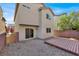 Backyard view of home with small deck at 8960 Fox Season Ave, Las Vegas, NV 89178