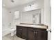 Bathroom with vanity and bathtub at 8960 Fox Season Ave, Las Vegas, NV 89178