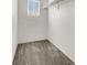 Spacious walk-in closet with neutral carpeting and shelving at 8960 Fox Season Ave, Las Vegas, NV 89178