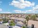 An elevated view of a two-story home situated in a well-established neighborhood at 9123 Claretta Dr, Las Vegas, NV 89129