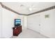 Well-lit bedroom with double door closet and TV stand at 9123 Claretta Dr, Las Vegas, NV 89129