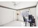 Bedroom featuring a gaming setup and a large window at 9123 Claretta Dr, Las Vegas, NV 89129