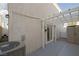 Private patio with pergola, string lights, and storage shed at 10009 Delicate Dew St, Las Vegas, NV 89183